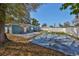 Large fenced backyard with concrete patio space, perfect for outdoor activities at 3127 W Lambright St # A, Tampa, FL 33614