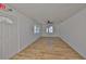Open concept living room with wood floors, a ceiling fan, and natural light at 3127 W Lambright St # A, Tampa, FL 33614