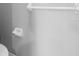 Bathroom wall with a toilet paper holder and towel rack at 3616 Cypress Meadows Rd, Tampa, FL 33624