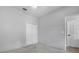 Bedroom with carpet flooring, ceiling fan, and standard closet at 3616 Cypress Meadows Rd, Tampa, FL 33624
