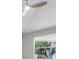 View of the ceiling fan with natural light coming from the window at 3616 Cypress Meadows Rd, Tampa, FL 33624