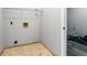 Laundry room with tiled floors and hookups for a washer and dryer at 3616 Cypress Meadows Rd, Tampa, FL 33624