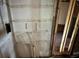 Interior view of an unfinished room shows stud walls and electrical box at 5410 15Th S Ave, Gulfport, FL 33707