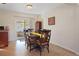 Comfortable dining area with sliding glass doors leading to the backyard at 6044 Dartmouth N Ave, St Petersburg, FL 33710