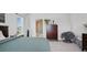 Inviting bedroom with ensuite bathroom, comfortable bed, and tasteful decor at 6127 164Th E Ave, Parrish, FL 34219
