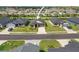 A charming single-Gathering home features manicured landscaping, an attached two-car garage, and a welcoming front porch at 6127 164Th E Ave, Parrish, FL 34219