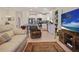 Bright, open floor plan featuring a well-equipped kitchen and comfortable living area at 6127 164Th E Ave, Parrish, FL 34219