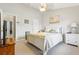 Cozy bedroom with en suite bathroom and ample natural light from the window at 6134 Fishhawk Crossing Blvd, Lithia, FL 33547