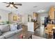 Open concept living room and kitchen and dining room, perfect for modern living and entertaining at 6134 Fishhawk Crossing Blvd, Lithia, FL 33547