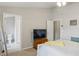 Comfortable main bedroom with ensuite bathroom and walk-in closet at 6134 Fishhawk Crossing Blvd, Lithia, FL 33547