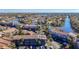 Scenic aerial view showcasing the community's waterfront location and lush landscaping at 6312 Newtown Cir # 12A5, Tampa, FL 33615