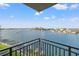 Scenic view from the balcony overlooking a beautiful cityscape with water and boats on a sunny day at 690 Island Way # 1003, Clearwater Beach, FL 33767
