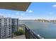 Scenic view from the balcony overlooking a beautiful cityscape with water and boats on a sunny day at 690 Island Way # 1003, Clearwater Beach, FL 33767