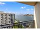 Scenic view from the balcony overlooking a beautiful cityscape with water and boats on a sunny day at 690 Island Way # 1003, Clearwater Beach, FL 33767