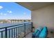 Enjoy relaxing on the balcony with seating and views of the water and marina at 690 Island Way # 1003, Clearwater Beach, FL 33767