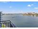 Balcony featuring expansive waterfront views with boat docks and city skyline at 690 Island Way # 1003, Clearwater Beach, FL 33767