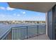 Balcony view featuring scenic views of the water and cityscape and a sliding glass door to the interior at 690 Island Way # 1003, Clearwater Beach, FL 33767