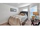 Bedroom with neutral walls, one window with blinds, and plush carpet flooring at 8949 Southern Charm Cir, Brooksville, FL 34613