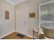 Inviting entryway featuring hardwood floors and a neutral color palette at 9010 Grand Bayou Ct, Tampa, FL 33635