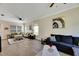 Open-concept living room featuring two sofas at 9010 Grand Bayou Ct, Tampa, FL 33635