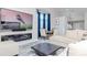 Open-concept living space features a modern fireplace and sleek decor at 9376 French Quarters Cir, Weeki Wachee, FL 34613