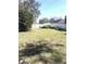 Spacious backyard with a white vinyl fence and plenty of room to play at 4905 Court St, Zephyrhills, FL 33541