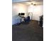 Simple bedroom with desk, carpeted floor, and ample space, ready to be personalized and styled at 4905 Court St, Zephyrhills, FL 33541