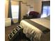 Comfortable bedroom with neutral walls, carpet, and plenty of natural light at 4905 Court St, Zephyrhills, FL 33541