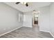 Bedroom with fresh neutral paint, a window, and wood-look flooring at 10263 Gandy N Blvd # 2014, St Petersburg, FL 33702