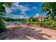 Scenic waterfront dock with seating areas, offering stunning views of the lake and surrounding landscape at 10263 Gandy N Blvd # 2014, St Petersburg, FL 33702