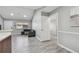 Open living area with neutral paint, wood-look flooring, and comfortable seating at 10263 Gandy N Blvd # 2014, St Petersburg, FL 33702