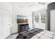 Bedroom featuring carpet, ceiling fan, closet, television and windows at 14532 Mirabelle Vista Cir, Tampa, FL 33626