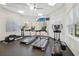 Well-lit gym equipped with treadmills and elliptical machines, perfect for a complete workout at 14532 Mirabelle Vista Cir, Tampa, FL 33626