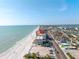 Coastal condo building with beach access and nearby highway at 14700 Gulf Blvd # 405, Madeira Beach, FL 33708