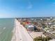 Coastal condo building with beach access and surrounding residential area at 14700 Gulf Blvd # 405, Madeira Beach, FL 33708