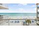 Balcony view of sandy beach and ocean at 14700 Gulf Blvd # 405, Madeira Beach, FL 33708