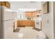 Clean, functional kitchen with ample counter space and modern white appliances at 14700 Gulf Blvd # 405, Madeira Beach, FL 33708