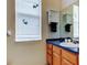 Bathroom with vanity cabinet and natural light at 1547 Daylily Dr, Trinity, FL 34655