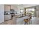 Modern kitchen with stainless steel appliances, granite countertops, and a stylish center island at 1741 Cobb Trl, Parrish, FL 34219