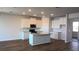 Bright kitchen featuring stainless appliances, granite countertops, and a center island at 1741 Cobb Trl, Parrish, FL 34219