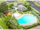 Aerial view of community pool and lounge area at 179 114Th N Ave # 179, St Petersburg, FL 33716