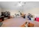 Vast bonus room with carpeted floors and vaulted ceilings offering plenty of flexible living space at 182 Dahoon Ct, Spring Hill, FL 34609