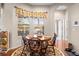 Sunny breakfast nook with a round table, comfortable seating, and a large window at 182 Dahoon Ct, Spring Hill, FL 34609
