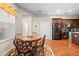 Cozy breakfast nook featuring a round table with seating and wood-look flooring at 182 Dahoon Ct, Spring Hill, FL 34609