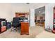 Functional home office with a spacious desk and ample storage, perfect for working from home at 182 Dahoon Ct, Spring Hill, FL 34609