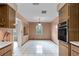 Well-lit kitchen with ample counter and cabinet space at 19230 Lake Allen Rd, Lutz, FL 33558