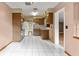 Open-concept kitchen features ample counter space and cabinetry at 19230 Lake Allen Rd, Lutz, FL 33558