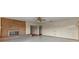 Bright living room with brick fireplace, perfect for gatherings at 19230 Lake Allen Rd, Lutz, FL 33558