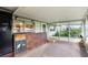 Covered patio offers a peaceful retreat at 19230 Lake Allen Rd, Lutz, FL 33558