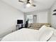 Bright bedroom featuring a ceiling fan, window, and bed at 211 Brandy Wine Dr # 211, Largo, FL 33771